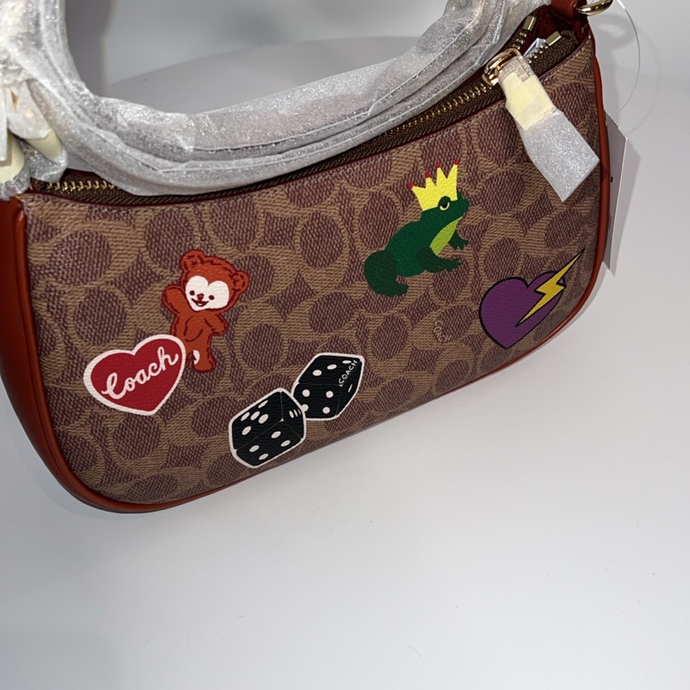 πNWT COACH TERI SHOULDER BAG IN SIGNATURE CANVAS WITH STICKER PRINT - Picture 13 of 17